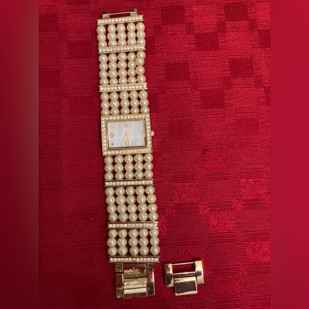 Isaac Mizrahi pearl-look bracelet watch.